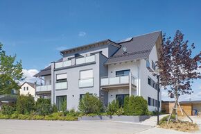 Mehrfamilienhaus in verputzter Holzbauweise und 8 Wohneinheiten