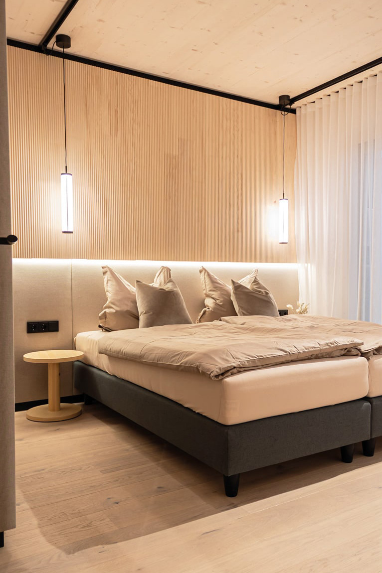 /files/dateien/H%C3%A4user/Elements/Three/modulhaus-holz-design-schlafzimmer.jpg