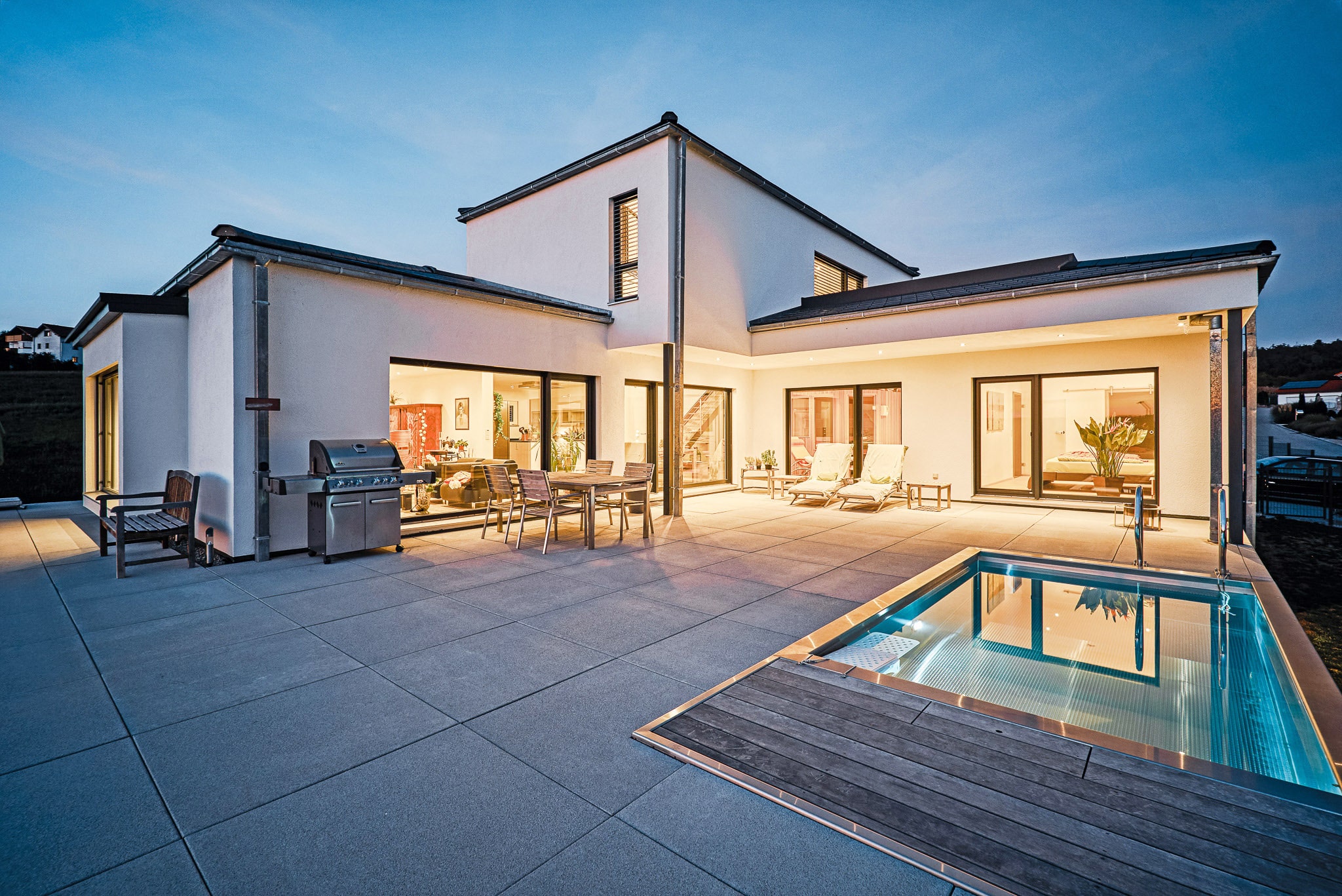 /files/dateien/H%C3%A4user/Foto%20Holzhaus/holzhaus-modern-verputzt.jpg