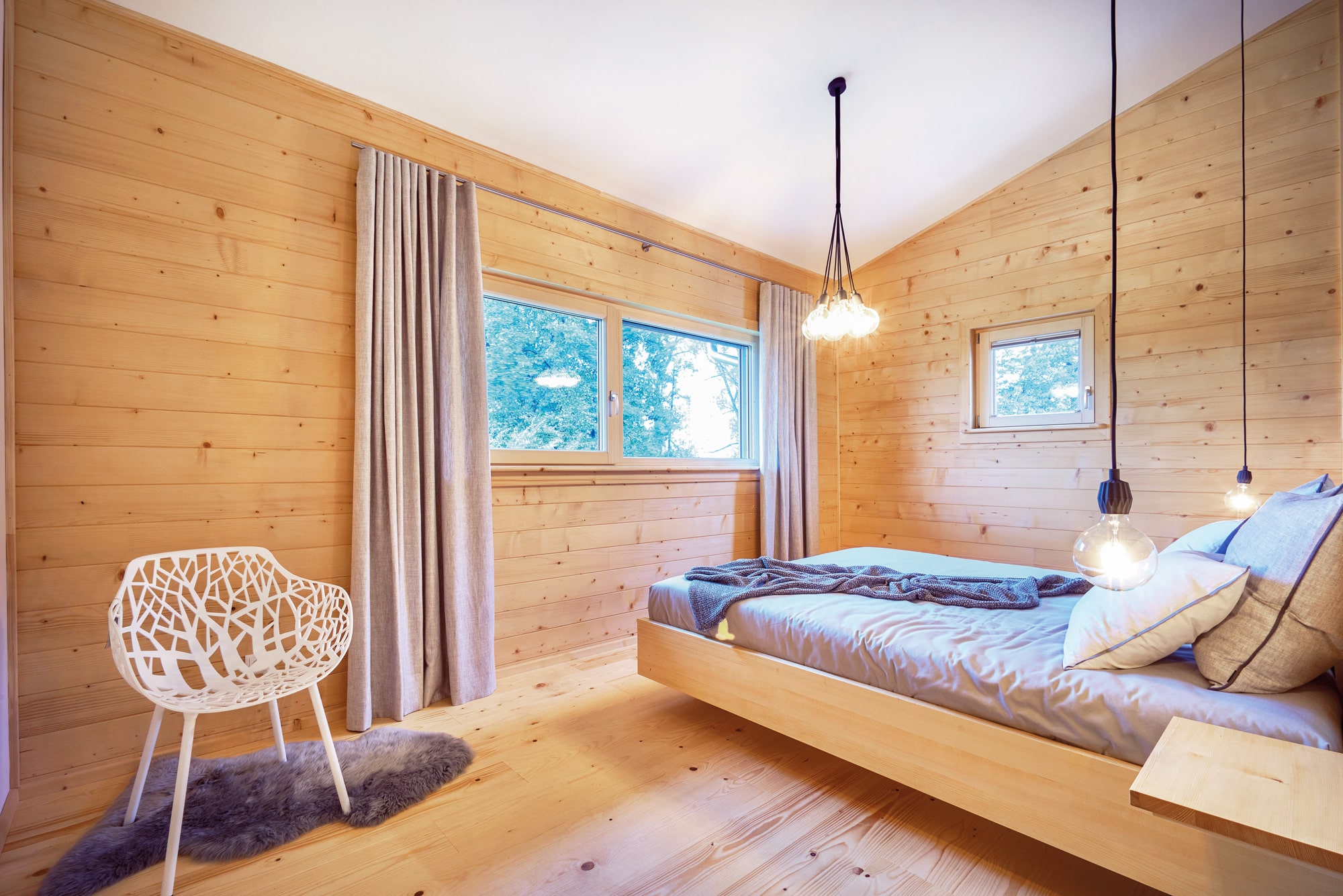 /files/dateien/H%C3%A4user/Interior%20Design/Schlafzimmer%20%26%20Ankleide/Schlafzimmer-Holzhaus_2.jpg