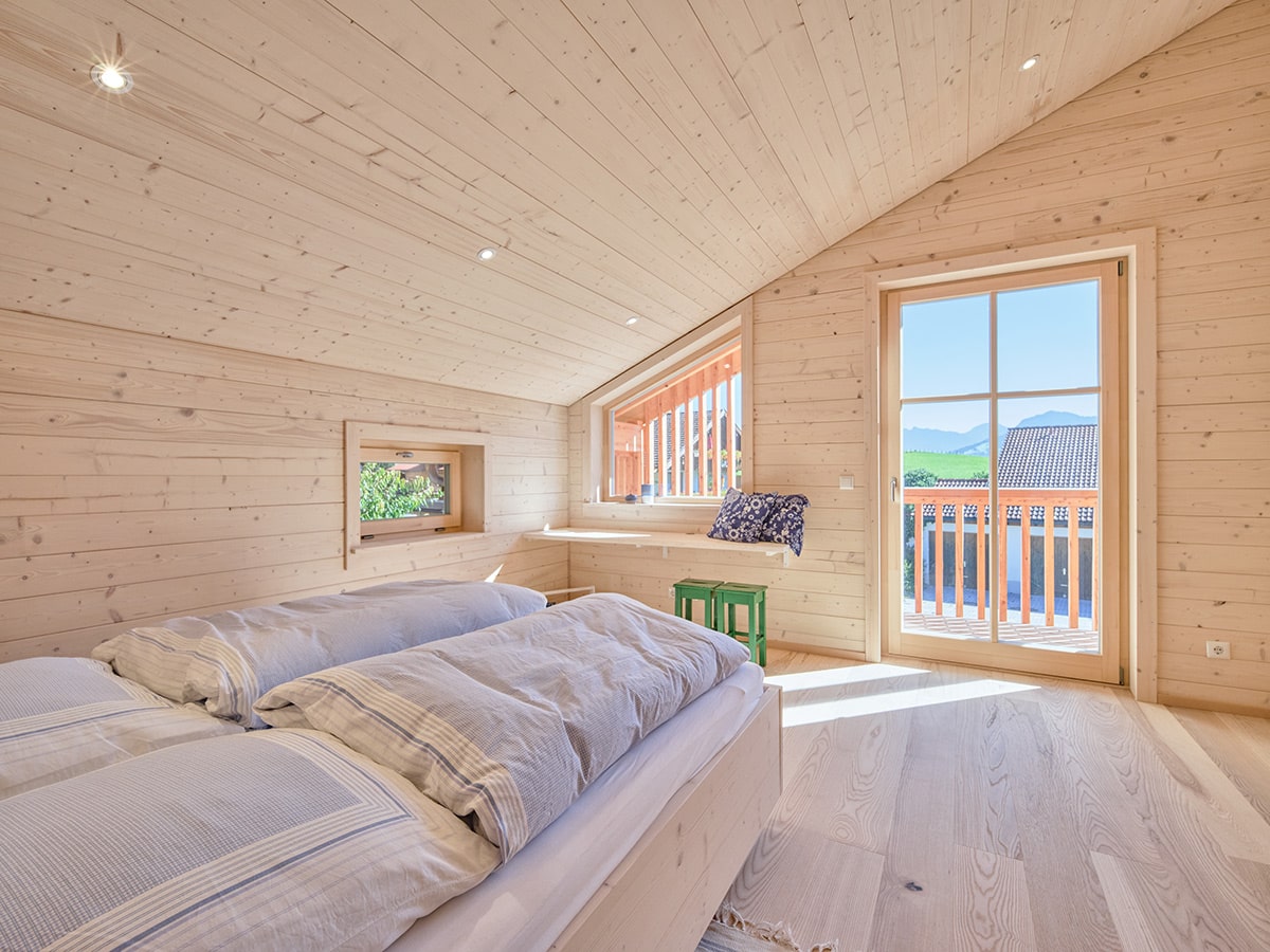 /files/dateien/H%C3%A4user/Konzept%20Pur/Holzhaus-Konzept-Pur_Schlafzimmer_34-min.jpg