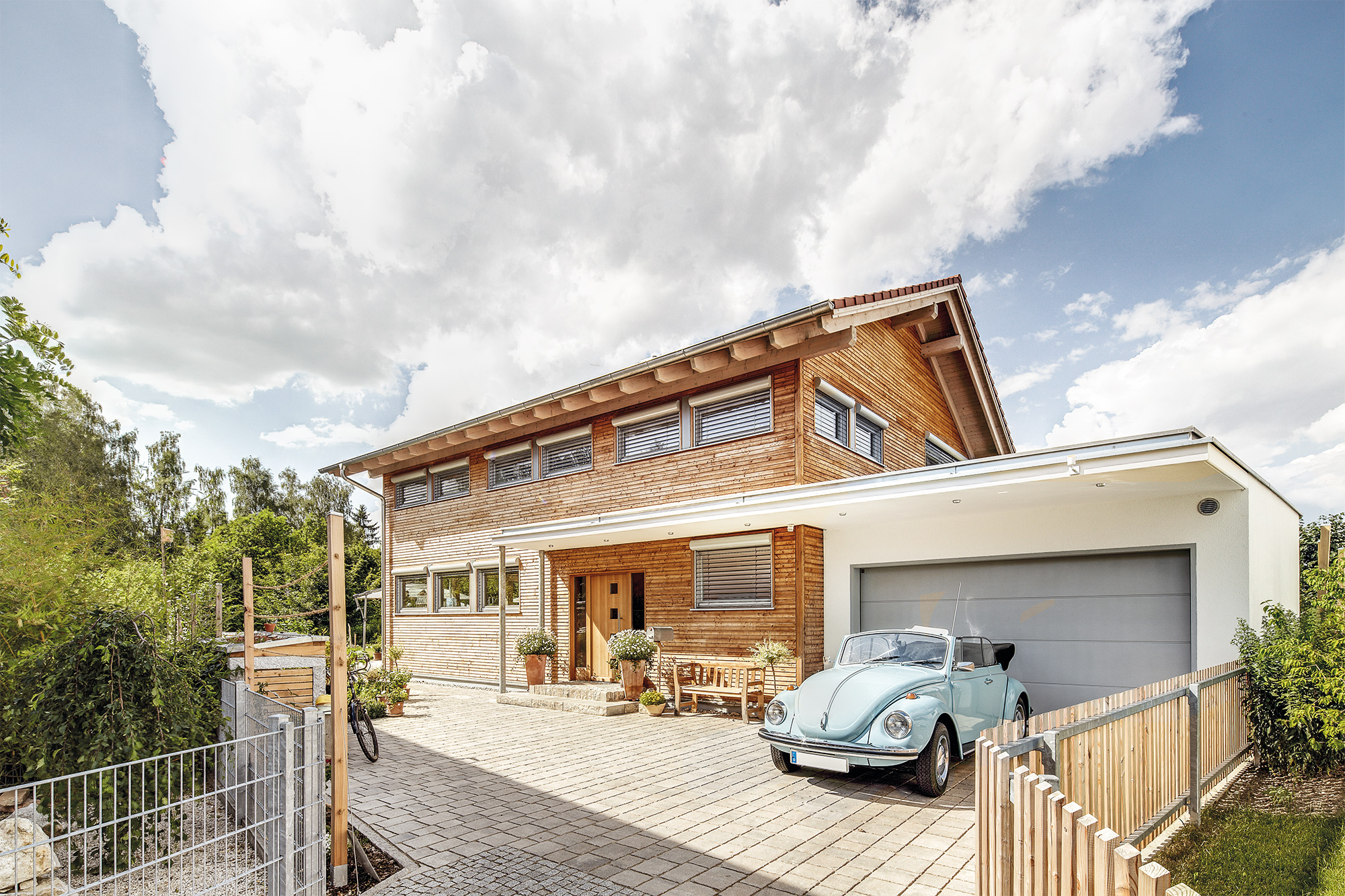 /files/dateien/H%C3%A4user/Kundenh%C3%A4user/Augsburg/modernes-holzhaus-augsburg-holzfassade.jpg