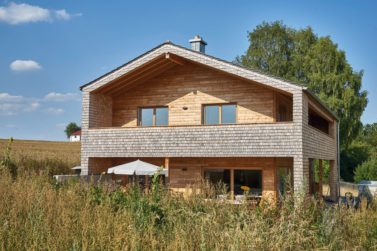 /files/dateien/H%C3%A4user/Kundenh%C3%A4user/Brunner/kundenhaus-brunner-fassade-holzschindel.jpg