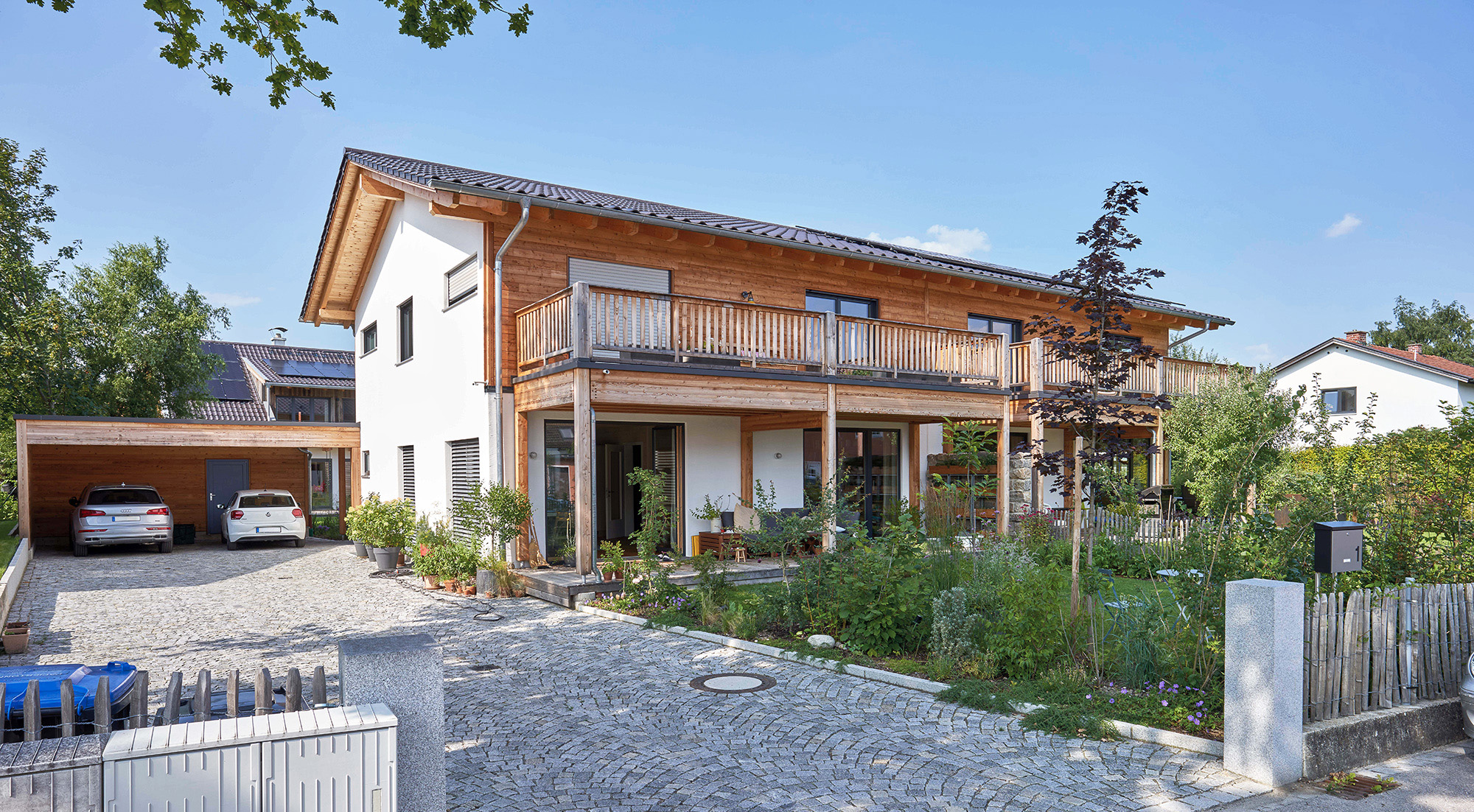 /files/dateien/H%C3%A4user/Kundenh%C3%A4user/Rinnsee/reihenhaus-doppelhaus-rinnsee-holz-putz-fassade.jpg