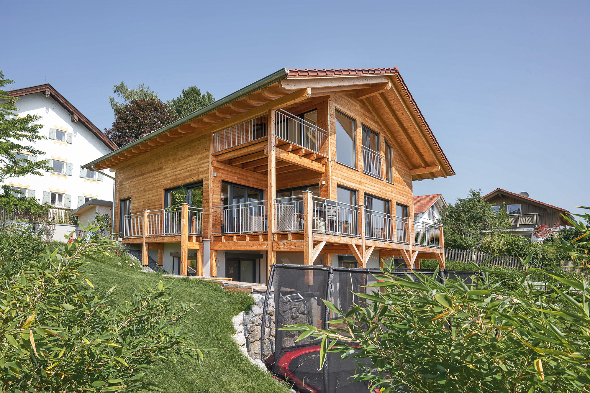 /files/dateien/H%C3%A4user/Kundenh%C3%A4user/Staffelsee/holzhaus-in-hanglage-staffelsee-drei-geschosse.jpg