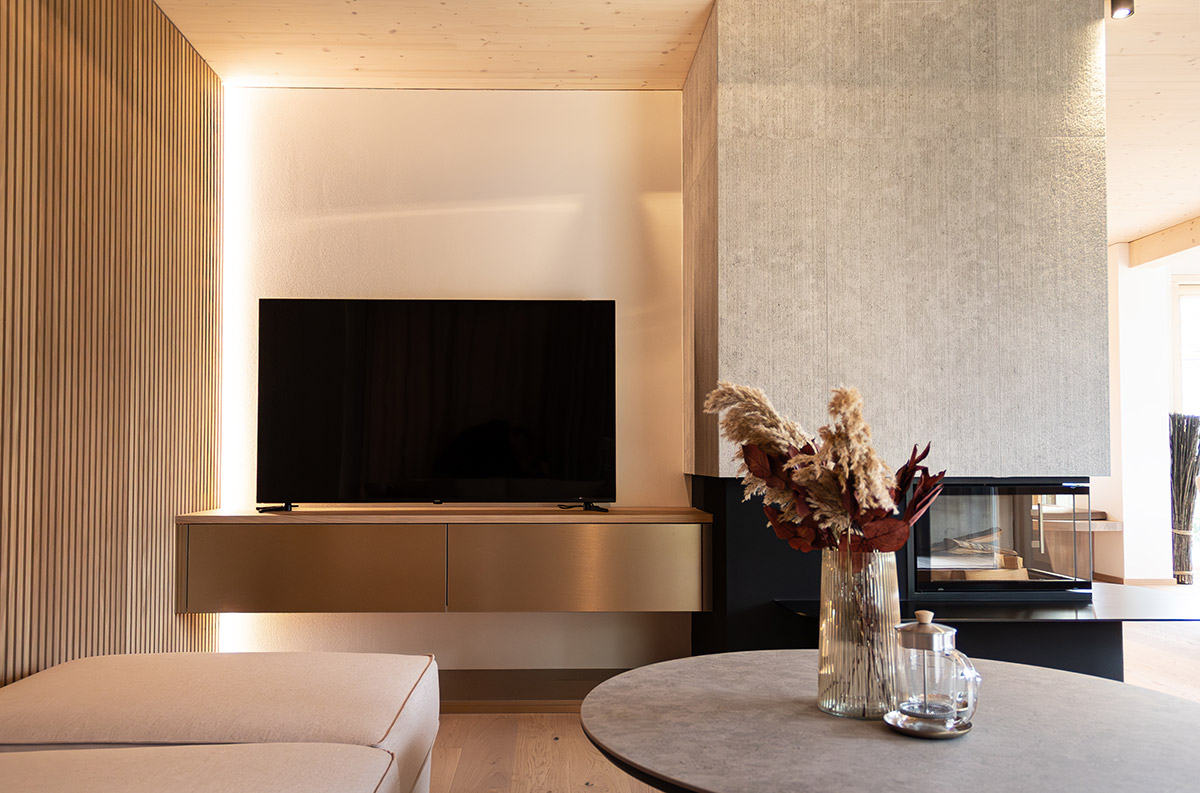 /files/dateien/H%C3%A4user/Musterh%C3%A4user/Starnberg%20Final/design-holzhaus-starnberg-modernes-wohnzimmer.jpg